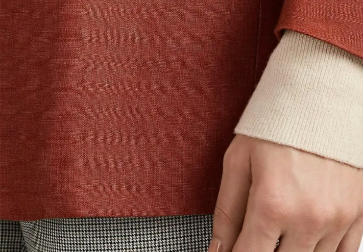 Grey shirt with mini design, not too bright or too dark.